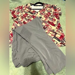 Jaanuu scrubs. Great shape from smoke free home! Top is 2XL, and bottoms are 1XL